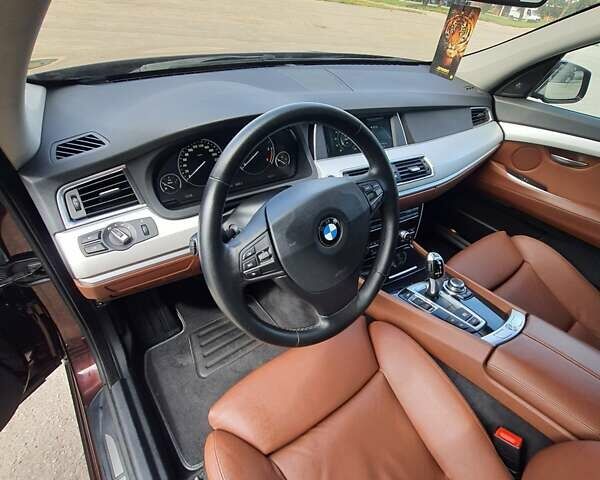 Красный БМВ 5 Серия ГТ, объемом двигателя 3 л и пробегом 286 тыс. км за 20450 $, фото 7 на Automoto.ua