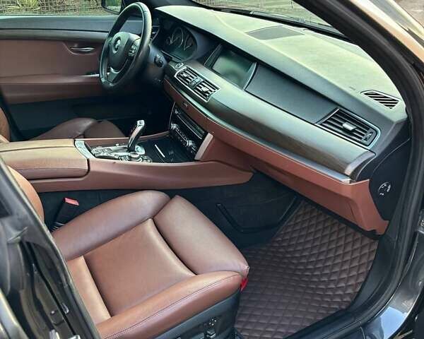 Серый БМВ 5 Серия ГТ, объемом двигателя 3 л и пробегом 275 тыс. км за 14000 $, фото 3 на Automoto.ua