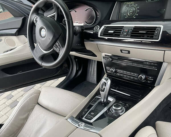 Серый БМВ 5 Серия ГТ, объемом двигателя 3 л и пробегом 330 тыс. км за 18000 $, фото 5 на Automoto.ua