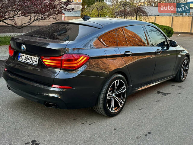 Серый БМВ 5 Серия ГТ, объемом двигателя 3 л и пробегом 222 тыс. км за 15000 $, фото 3 на Automoto.ua