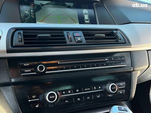 Білий БМВ 5 Серія, об'ємом двигуна 2 л та пробігом 215 тис. км за 12990 $, фото 19 на Automoto.ua