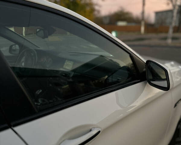 Белый БМВ 5 Серия, объемом двигателя 2 л и пробегом 235 тыс. км за 13700 $, фото 4 на Automoto.ua