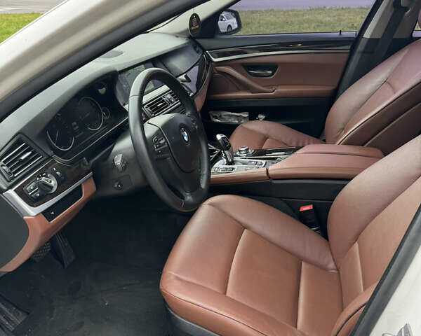 Белый БМВ 5 Серия, объемом двигателя 2 л и пробегом 157 тыс. км за 16700 $, фото 14 на Automoto.ua