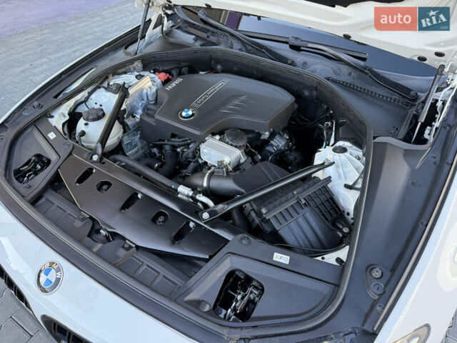 Белый БМВ 5 Серия, объемом двигателя 2 л и пробегом 148 тыс. км за 18800 $, фото 77 на Automoto.ua