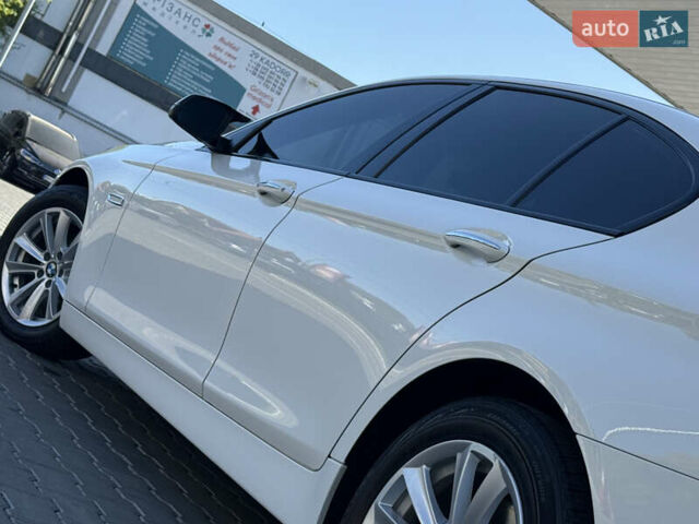 Белый БМВ 5 Серия, объемом двигателя 2 л и пробегом 148 тыс. км за 18800 $, фото 8 на Automoto.ua