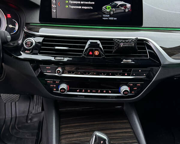 Белый БМВ 5 Серия, объемом двигателя 2 л и пробегом 128 тыс. км за 26000 $, фото 12 на Automoto.ua