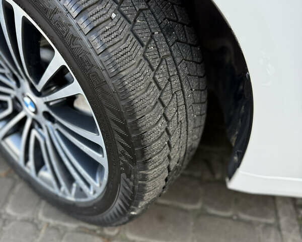 Белый БМВ 5 Серия, объемом двигателя 2 л и пробегом 215 тыс. км за 22950 $, фото 4 на Automoto.ua