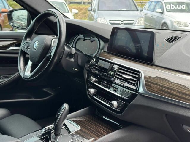 Белый БМВ 5 Серия, объемом двигателя 2 л и пробегом 117 тыс. км за 26690 $, фото 41 на Automoto.ua