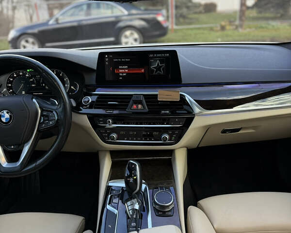 Белый БМВ 5 Серия, объемом двигателя 2 л и пробегом 215 тыс. км за 22950 $, фото 42 на Automoto.ua