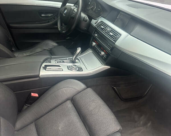 Белый БМВ 5 Серия, объемом двигателя 2 л и пробегом 300 тыс. км за 14777 $, фото 6 на Automoto.ua