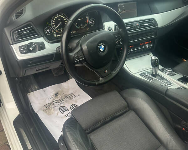 Белый БМВ 5 Серия, объемом двигателя 2 л и пробегом 300 тыс. км за 14777 $, фото 13 на Automoto.ua