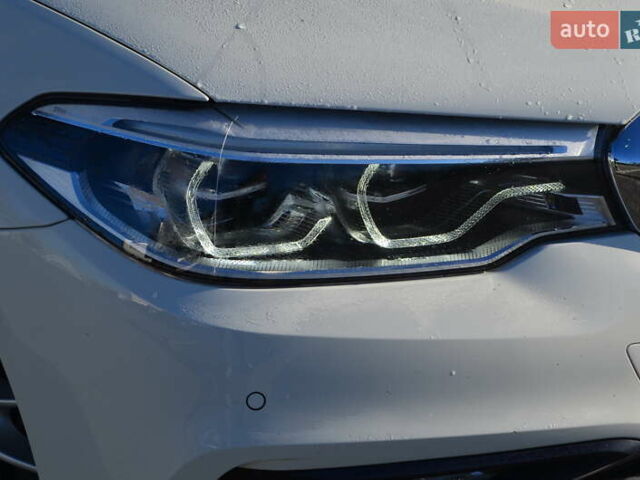 Белый БМВ 5 Серия, объемом двигателя 2.99 л и пробегом 158 тыс. км за 30817 $, фото 4 на Automoto.ua