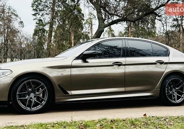 Бежевый БМВ 5 Серия, объемом двигателя 2 л и пробегом 137 тыс. км за 35777 $, фото 1 на Automoto.ua