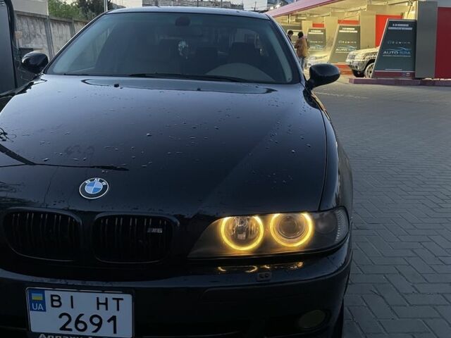Черный БМВ 5 Серия, объемом двигателя 2.5 л и пробегом 350 тыс. км за 7500 $, фото 5 на Automoto.ua