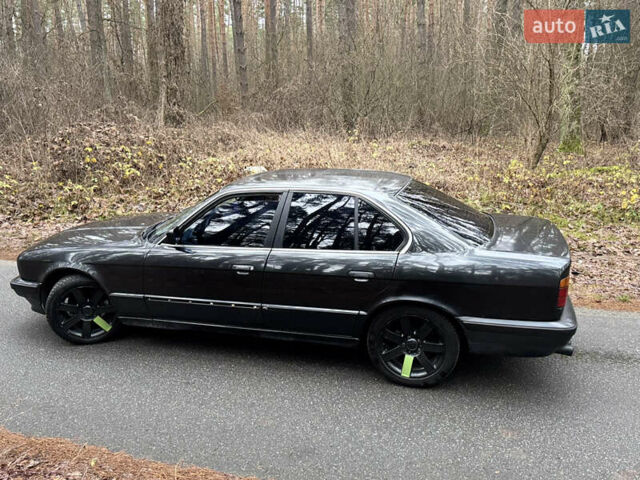 Черный БМВ 5 Серия, объемом двигателя 2 л и пробегом 335 тыс. км за 2499 $, фото 6 на Automoto.ua