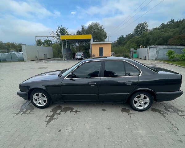 Чорний БМВ 5 Серія, об'ємом двигуна 2 л та пробігом 333 тис. км за 1500 $, фото 4 на Automoto.ua