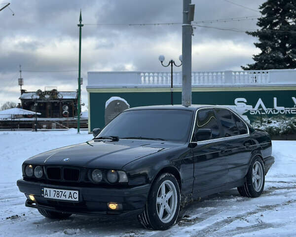 Черный БМВ 5 Серия, объемом двигателя 2.5 л и пробегом 261 тыс. км за 3700 $, фото 1 на Automoto.ua