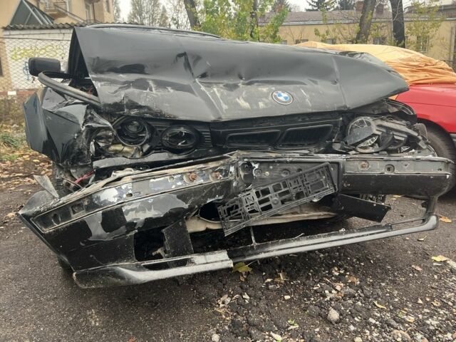 Черный БМВ 5 Серия, объемом двигателя 2.5 л и пробегом 460 тыс. км за 2360 $, фото 1 на Automoto.ua