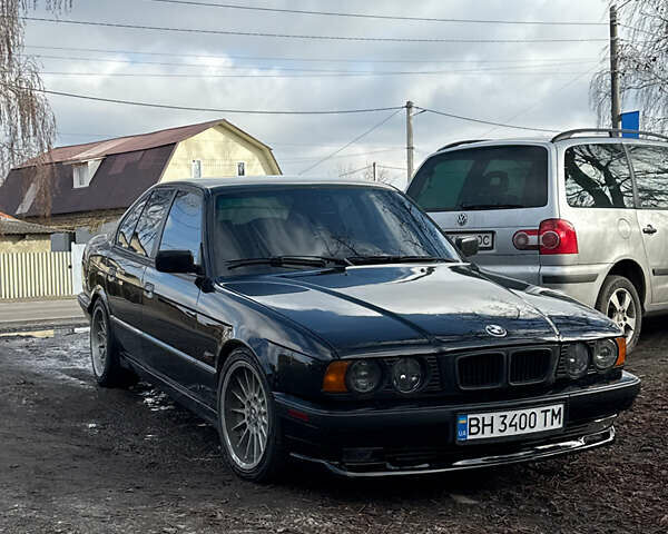 Чорний БМВ 5 Серія, об'ємом двигуна 2.5 л та пробігом 240 тис. км за 5500 $, фото 1 на Automoto.ua