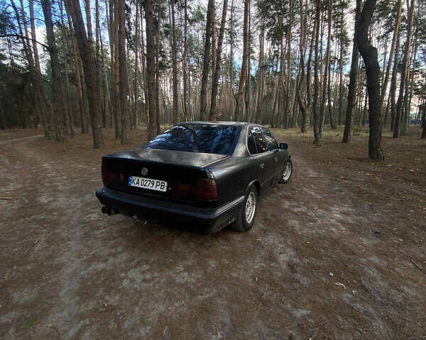 Черный БМВ 5 Серия, объемом двигателя 2 л и пробегом 200 тыс. км за 1999 $, фото 1 на Automoto.ua