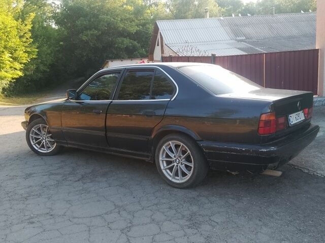 Чорний БМВ 5 Серія, об'ємом двигуна 2.4 л та пробігом 380 тис. км за 1250 $, фото 1 на Automoto.ua