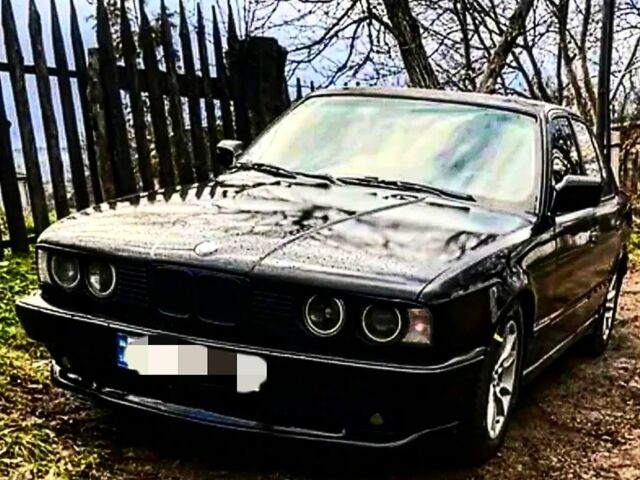 Черный БМВ 5 Серия, объемом двигателя 2.5 л и пробегом 150 тыс. км за 1550 $, фото 1 на Automoto.ua