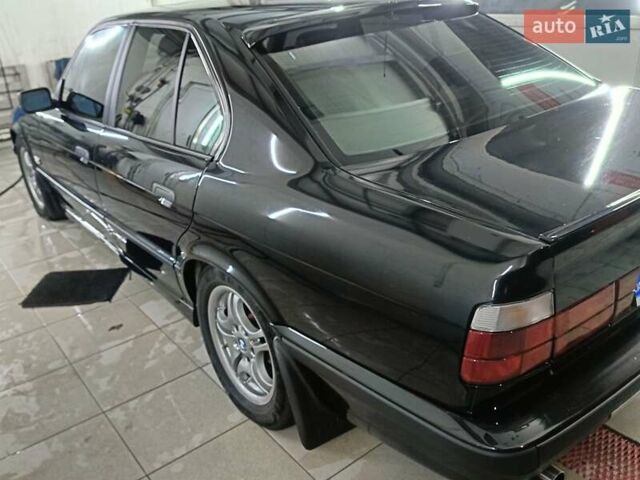 Черный БМВ 5 Серия, объемом двигателя 3 л и пробегом 525 тыс. км за 7400 $, фото 1 на Automoto.ua