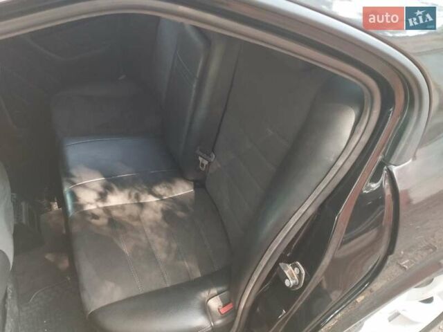 Черный БМВ 5 Серия, объемом двигателя 2 л и пробегом 39 тыс. км за 4300 $, фото 3 на Automoto.ua