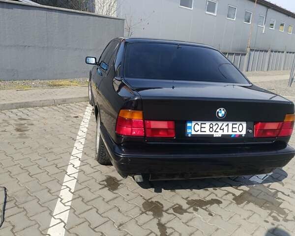 Черный БМВ 5 Серия, объемом двигателя 2.5 л и пробегом 320 тыс. км за 3600 $, фото 2 на Automoto.ua