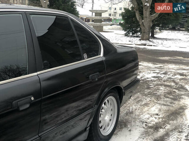 Черный БМВ 5 Серия, объемом двигателя 2 л и пробегом 350 тыс. км за 2020 $, фото 13 на Automoto.ua