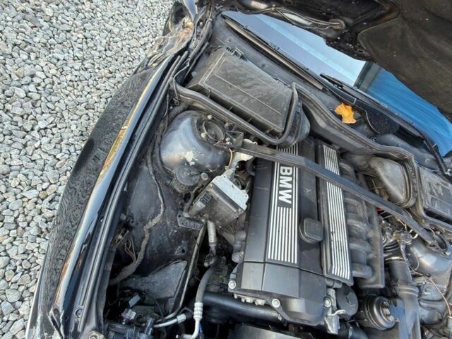 Черный БМВ 5 Серия, объемом двигателя 2.5 л и пробегом 300 тыс. км за 2900 $, фото 19 на Automoto.ua