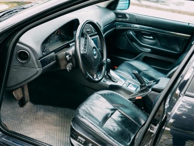 Черный БМВ 5 Серия, объемом двигателя 4.4 л и пробегом 400 тыс. км за 13000 $, фото 10 на Automoto.ua