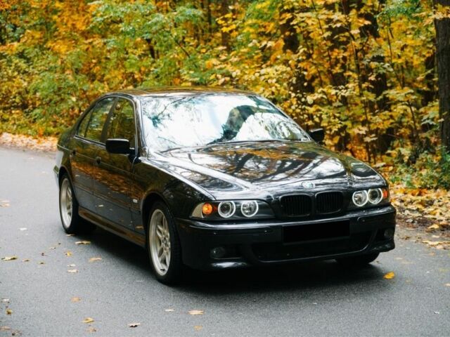 Черный БМВ 5 Серия, объемом двигателя 4.4 л и пробегом 400 тыс. км за 13000 $, фото 6 на Automoto.ua