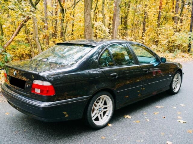 Черный БМВ 5 Серия, объемом двигателя 4.4 л и пробегом 400 тыс. км за 13000 $, фото 4 на Automoto.ua