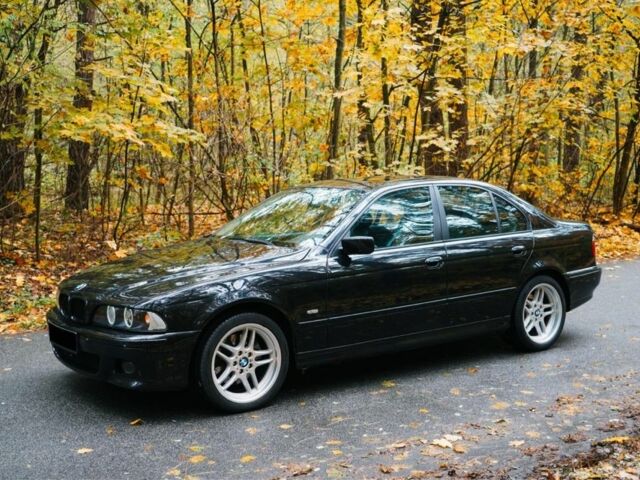 Черный БМВ 5 Серия, объемом двигателя 4.4 л и пробегом 400 тыс. км за 13000 $, фото 1 на Automoto.ua