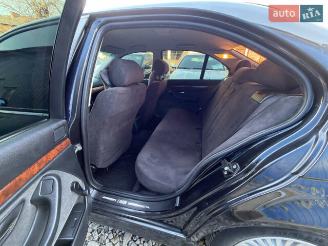 Черный БМВ 5 Серия, объемом двигателя 2.5 л и пробегом 300 тыс. км за 2900 $, фото 12 на Automoto.ua
