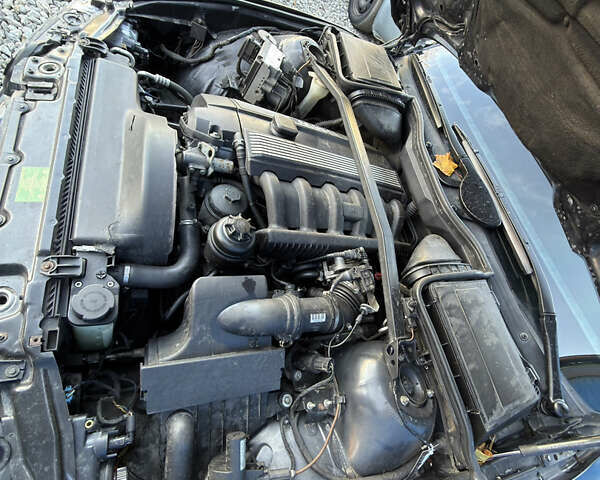 Черный БМВ 5 Серия, объемом двигателя 2.5 л и пробегом 300 тыс. км за 2900 $, фото 20 на Automoto.ua