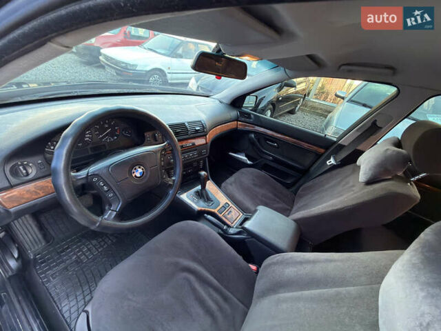 Черный БМВ 5 Серия, объемом двигателя 2.5 л и пробегом 300 тыс. км за 2900 $, фото 10 на Automoto.ua