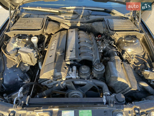 Черный БМВ 5 Серия, объемом двигателя 2 л и пробегом 269 тыс. км за 3299 $, фото 7 на Automoto.ua