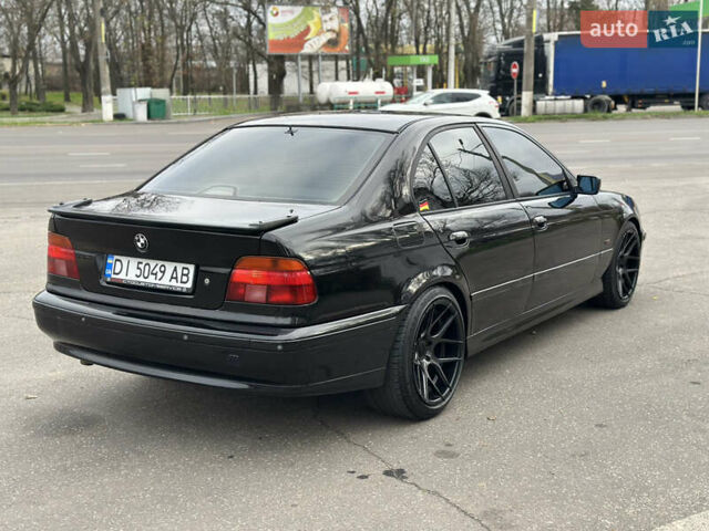Черный БМВ 5 Серия, объемом двигателя 2.79 л и пробегом 303 тыс. км за 3999 $, фото 9 на Automoto.ua