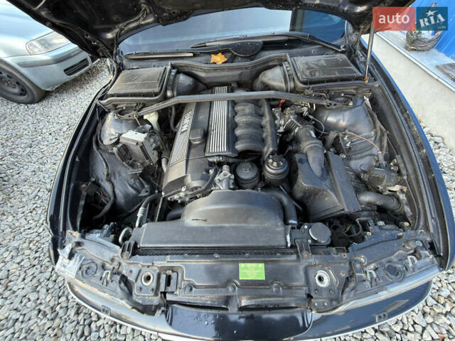 Черный БМВ 5 Серия, объемом двигателя 2.5 л и пробегом 300 тыс. км за 2900 $, фото 18 на Automoto.ua