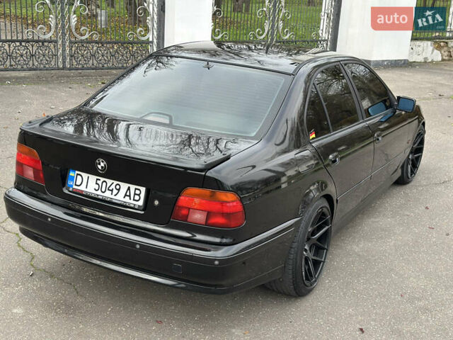 Черный БМВ 5 Серия, объемом двигателя 2.79 л и пробегом 303 тыс. км за 3999 $, фото 14 на Automoto.ua