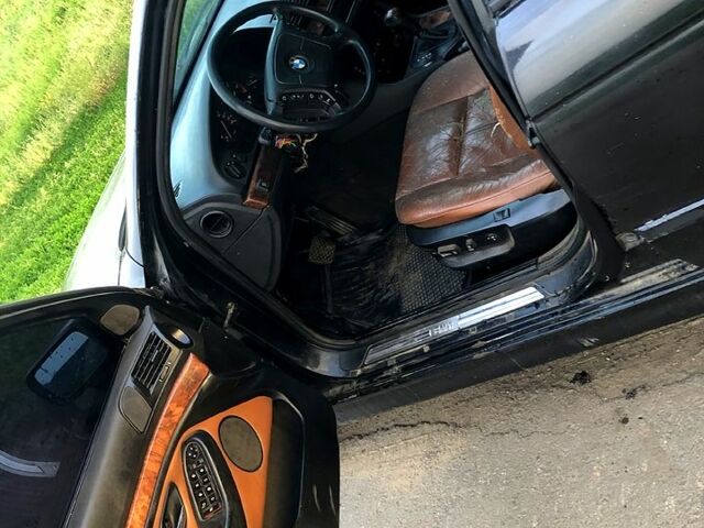 Черный БМВ 5 Серия, объемом двигателя 2.8 л и пробегом 600 тыс. км за 3200 $, фото 7 на Automoto.ua