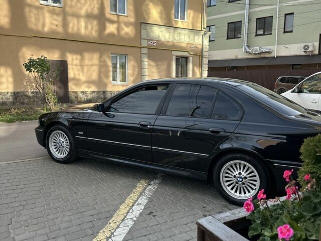 Черный БМВ 5 Серия, объемом двигателя 2.5 л и пробегом 300 тыс. км за 4999 $, фото 7 на Automoto.ua