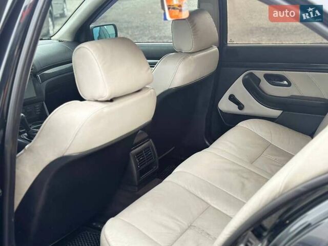 Черный БМВ 5 Серия, объемом двигателя 2.5 л и пробегом 420 тыс. км за 4300 $, фото 7 на Automoto.ua