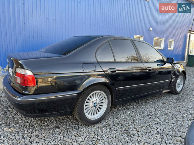 Черный БМВ 5 Серия, объемом двигателя 2.5 л и пробегом 300 тыс. км за 2900 $, фото 5 на Automoto.ua