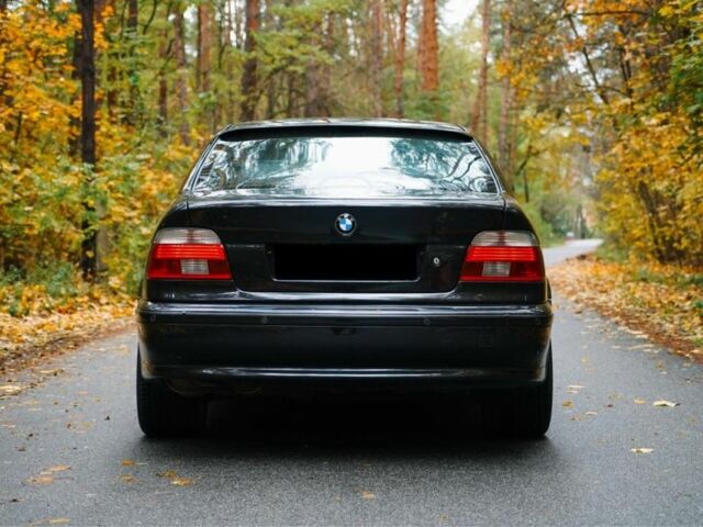 Черный БМВ 5 Серия, объемом двигателя 4.4 л и пробегом 400 тыс. км за 13000 $, фото 3 на Automoto.ua