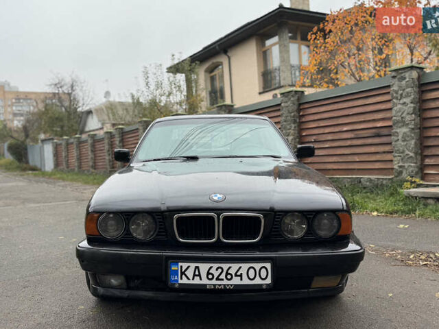 Черный БМВ 5 Серия, объемом двигателя 2.5 л и пробегом 471 тыс. км за 3500 $, фото 1 на Automoto.ua