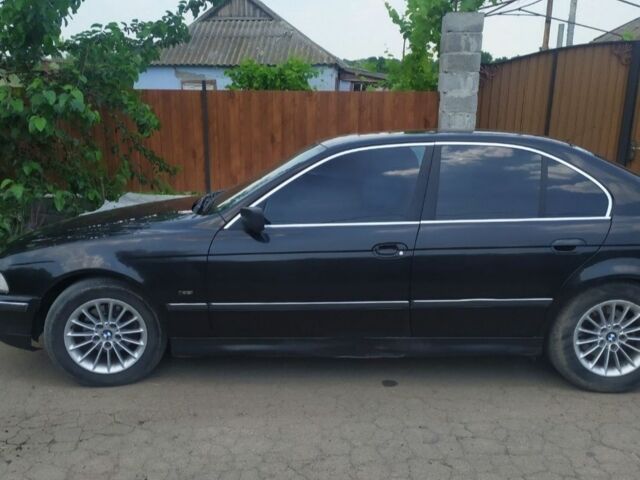 Черный БМВ 5 Серия, объемом двигателя 2.5 л и пробегом 150 тыс. км за 3200 $, фото 1 на Automoto.ua