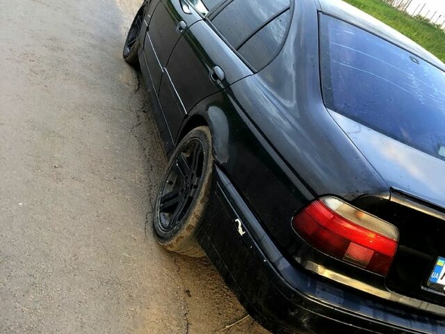 Черный БМВ 5 Серия, объемом двигателя 2.8 л и пробегом 600 тыс. км за 3200 $, фото 2 на Automoto.ua